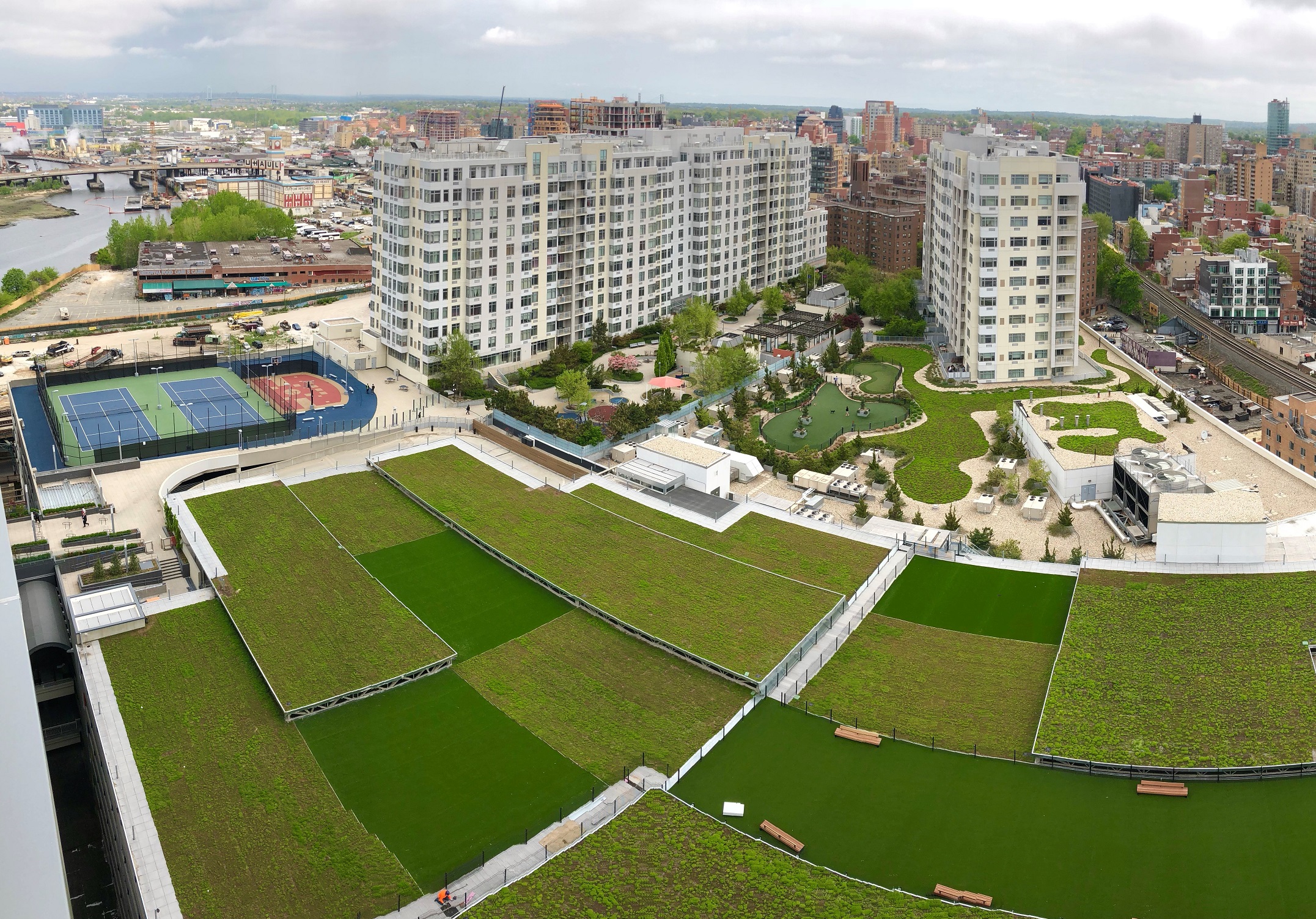 Multi-level green roof creates a cascading waterfall of vibrant green